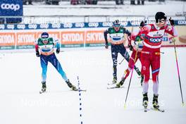 01.03.2020, Lahti Finland (FIN): Roman Furger (SUI), Johannes Hoesflot Klaebo (NOR), (l-r)  - FIS world cup cross-country, 4x10km men, Lahti (FIN). www.nordicfocus.com. © Modica/NordicFocus. Every downloaded picture is fee-liable.