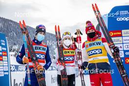 12.12.2020, Davos, Switzerland (SUI): Federico Pellegrino (ITA), Rosie Brennan (USA), Alexander Bolshunov (RUS), (l-r)  - FIS world cup cross-country, individual sprint, Davos (SUI). www.nordicfocus.com. © Modica/NordicFocus. Every downloaded picture is fee-liable.