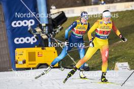 20.12.2020, Dresden, Germany (GER): Lea Fischer (SUI), Bayani Jialin (CHN), (l-r)  - FIS world cup cross-country, team sprint, Dresden (GER). www.nordicfocus.com. © Modica/NordicFocus. Every downloaded picture is fee-liable.