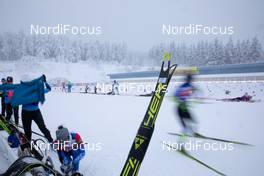 12.01.2021, Oberhof, Germany (GER): Event Feature: undefined athletes compete while a Fischer ski waits for his owner -  IBU World Cup Biathlon, training, Oberhof (GER). www.nordicfocus.com. © Manzoni/NordicFocus. Every downloaded picture is fee-liable.