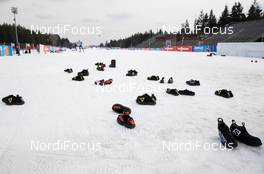 10.03.2021, Nove Mesto, Czech Republic (CZE): Event Feature: athletes place their over-boots on the snow - IBU World Cup Biathlon, training, Nove Mesto (CZE). www.nordicfocus.com. © Manzoni/NordicFocus. Every downloaded picture is fee-liable.