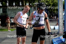 15.08.2021, Wiesbaden, Germany (GER): Johannes Thingnes Boe (NOR), Tarjei Boe (NOR) - City Biathlon Wiesbaden, Wiesbaden (GER). www.nordicfocus.com. © Deubert/Nordicfocus. For editorial use only. Resale or distribution is prohibited.