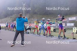 17.10.2021, Arcon, France (FRA): Loic Page (FRA) takes pictures of competing athletes  - Biathlon Samse Summer Tour, pursuit, Arcon (FRA). www.nordicfocus.com. © Manzoni/NordicFocus. Every downloaded picture is fee-liable.