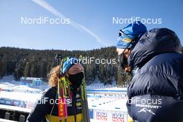 16.02.2021, Pokljuka, Slovenia (SLO): Hanna Oeberg (SWE), Jean Marc Chabloz (SUI), coach Team Sweden, (l-r) - IBU World Championships Biathlon, individual women, Pokljuka (SLO). www.nordicfocus.com. © Manzoni/NordicFocus. Every downloaded picture is fee-liable.