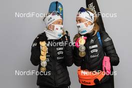 21.02.2021, Pokljuka, Slovenia (SLO): Tiril Eckhoff (NOR), Ingrid Landmark Tandrevold (NOR), (l-r) - IBU World Championships Biathlon, medals, Pokljuka (SLO). www.nordicfocus.com. © Manzoni/NordicFocus. Every downloaded picture is fee-liable.
