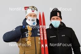 21.02.2021, Pokljuka, Slovenia (SLO): Sturla Holm Laegreid (NOR), Peter Blom (SWE), Madshus Race Service, (l-r) - IBU World Championships Biathlon, medals, Pokljuka (SLO). www.nordicfocus.com. © Manzoni/NordicFocus. Every downloaded picture is fee-liable.