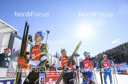 14.02.2021, Pokljuka, Slovenia (SLO): Rene Zahkna (EST), Tsukasa Kobonoki (JPN), Mihail Usov (MDA), (l-r) - IBU World Championships Biathlon, pursuit men, Pokljuka (SLO). www.nordicfocus.com. © Manzoni/NordicFocus. Every downloaded picture is fee-liable.