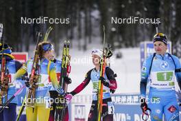18.02.2021, Pokljuka, Slovenia (SLO): Tiril Eckhoff (NOR), Hanna Oeberg (SWE), Julia Simon (FRA), (l-r) - IBU World Championships Biathlon, single mixed relay, Pokljuka (SLO). www.nordicfocus.com. © Thibaut/NordicFocus. Every downloaded picture is fee-liable.