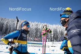 13.02.2021, Pokljuka, Slovenia (SLO): Elvira Oeberg (SWE), Jean Marc Chabloz (SUI), coach Team Sweden, (l-r) - IBU World Championships Biathlon, sprint women, Pokljuka (SLO). www.nordicfocus.com. © Manzoni/NordicFocus. Every downloaded picture is fee-liable.