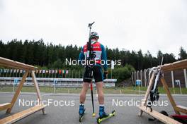 25.08.2021, Nove Mesto na Morave, Czech Republic (CZE): Event Feature: British athlete waits for his shooting - IBU Summer Biathlon World Championships, training, Nove Mesto na Morave (CZE). www.nordicfocus.com. © Manzoni/NordicFocus. Every downloaded picture is fee-liable.