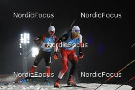 27.11.2021, Oestersund, Sweden, (SWE): Trevor Kiers (CAN), Lukas Hofer (ITA), (l-r) - IBU World Cup Biathlon, individual men, Oestersund (SWE). www.nordicfocus.com. © Manzoni/NordicFocus. Every downloaded picture is fee-liable.