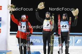 27.11.2021, Oestersund, Sweden, (SWE): Scott Gow (CAN), Johannes Thingnes Boe (NOR), Sivert Guttorm Bakken (NOR), (l-r) - IBU World Cup Biathlon, individual men, Oestersund (SWE). www.nordicfocus.com. © Manzoni/NordicFocus. Every downloaded picture is fee-liable.