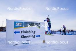 26.11.2021, Oestersund, Sweden, (SWE): Undefined athlete passes a track sign - IBU World Cup Biathlon, training, Oestersund (SWE). www.nordicfocus.com. © Manzoni/NordicFocus. Every downloaded picture is fee-liable.