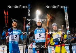 05.12.2021, Oestersund, Sweden, (SWE): Emilien Jacquelin (FRA), Vetle Sjaastad Christiansen (NOR), Sebastian Samuelsson (SWE), (l-r) - IBU World Cup Biathlon, pursuit men, Oestersund (SWE). www.nordicfocus.com. © Manzoni/NordicFocus. Every downloaded picture is fee-liable.