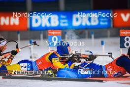 04.12.2021, Oestersund, Sweden, (SWE): Sebastian Samuelsson (SWE), Quentin Fillon Maillet (FRA), (l-r) - IBU World Cup Biathlon, relay men, Oestersund (SWE). www.nordicfocus.com. © Manzoni/NordicFocus. Every downloaded picture is fee-liable.