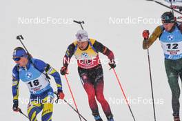 11.12.2021, Hochfilzen, Austria (AUT): Dmytro Pidruchnyi (UKR), Vetle Sjaastad Christiansen (NOR), Vytautas Strolia (LTU) -  IBU World Cup Biathlon, pursuit men, Hochfilzen (AUT). www.nordicfocus.com. © Tumashov/NordicFocus. Every downloaded picture is fee-liable.