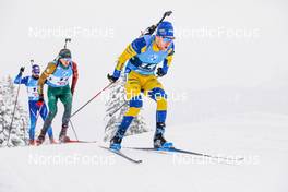11.12.2021, Hochfilzen, Austria (AUT): Sebastian Samuelsson (SWE), Vytautas Strolia (LTU), Benjamin Weger (SUI), (l-r) -  IBU World Cup Biathlon, pursuit men, Hochfilzen (AUT). www.nordicfocus.com. © Manzoni/NordicFocus. Every downloaded picture is fee-liable.