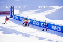12.12.2021, Hochfilzen, Austria (AUT): Industry Feature: Undefined athletes compete in front of Decathlon Banners -  IBU World Cup Biathlon, relay men, Hochfilzen (AUT). www.nordicfocus.com. © Manzoni/NordicFocus. Every downloaded picture is fee-liable.