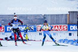 19.12.2021, Annecy-Le Grand Bornand, France (FRA): Quentin Fillon Maillet (FRA), Sivert Guttorm Bakken (NOR), (l-r) -  IBU World Cup Biathlon, mass men, Annecy-Le Grand Bornand (FRA). www.nordicfocus.com. © Manzoni/NordicFocus. Every downloaded picture is fee-liable.