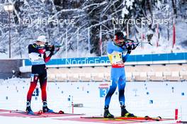 19.12.2021, Annecy-Le Grand Bornand, France (FRA): Vetle Sjaastad Christiansen (NOR), Quentin Fillon Maillet (FRA), (l-r) -  IBU World Cup Biathlon, mass men, Annecy-Le Grand Bornand (FRA). www.nordicfocus.com. © Manzoni/NordicFocus. Every downloaded picture is fee-liable.