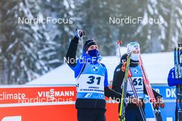 17.12.2021, Annecy-Le Grand Bornand, France (FRA): Quentin Fillon Maillet (FRA), Sturla Holm Laegreid (NOR), (l-r) -  IBU World Cup Biathlon, sprint men, Annecy-Le Grand Bornand (FRA). www.nordicfocus.com. © Manzoni/NordicFocus. Every downloaded picture is fee-liable.
