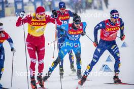 01.01.2021 Val Mustair, Switzerland (SUI): Alexander Bolshunov (RUS), Valentin Chauvin (FRA), Federico Pellegrino (ITA), (l-r)  - FIS world cup cross-country, tour de ski, individual sprint, Val Mustair (SUI). www.nordicfocus.com. © Modica/NordicFocus. Every downloaded picture is fee-liable.
