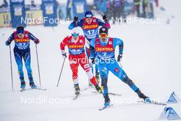 01.01.2021 Val Mustair, Switzerland (SUI): Richard Jouve (FRA), Maciej Starega (POL), (l-r), (l-r)  - FIS world cup cross-country, tour de ski, individual sprint, Val Mustair (SUI). www.nordicfocus.com. © Modica/NordicFocus. Every downloaded picture is fee-liable.