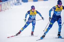 01.01.2021 Val Mustair, Switzerland (SUI): Krista Parmakoski (FIN), Johanna Matintalo (FIN), (l-r)  - FIS world cup cross-country, tour de ski, individual sprint, Val Mustair (SUI). www.nordicfocus.com. © Modica/NordicFocus. Every downloaded picture is fee-liable.