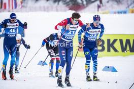 02.01.2021 Val Mustair, Switzerland (SUI): Jason Rueesch (SUI), Andrew Musgrave (GBR), Juho Mikkonen (FIN) (l-r) - FIS world cup cross-country, tour de ski, mass men, Val Mustair (SUI). www.nordicfocus.com. © Modica/NordicFocus. Every downloaded picture is fee-liable.