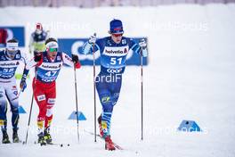 02.01.2021 Val Mustair, Switzerland (SUI): Dominik Bury (POL), Lauri Lepisto (FIN) (l-r) - FIS world cup cross-country, tour de ski, mass men, Val Mustair (SUI). www.nordicfocus.com. © Modica/NordicFocus. Every downloaded picture is fee-liable.