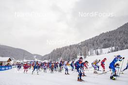 02.01.2021 Val Mustair, Switzerland (SUI): Start of the race (l-r)  - FIS world cup cross-country, tour de ski, mass women, Val Mustair (SUI). www.nordicfocus.com. © Modica/NordicFocus. Every downloaded picture is fee-liable.