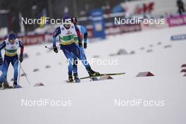 07.02.2021, Ulricehamn, Sweden (SWE): Roman Furger (SUI), Richard Jouve (FRA), (l-r)  - FIS world cup cross-country, team sprint, Ulricehamn (SWE). www.nordicfocus.com. © Thibaut/NordicFocus. Every downloaded picture is fee-liable.