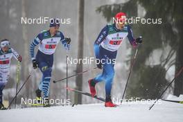 24.01.2021, Lahti Finland (FIN): Jonas Baumann (SUI), Perttu Hyvarinen (FIN), (l-r)  - FIS world cup cross-country, 4x10km men, Lahti (FIN). www.nordicfocus.com. © Modica/NordicFocus. Every downloaded picture is fee-liable.