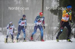 24.01.2021, Lahti Finland (FIN): Perttu Hyvarinen (FIN), Jonas Baumann (SUI), (l-r)  - FIS world cup cross-country, 4x10km men, Lahti (FIN). www.nordicfocus.com. © Modica/NordicFocus. Every downloaded picture is fee-liable.