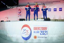 27.02.2021, Oberstdorf, Germany (GER): Erik Valnes (NOR), Johannes Hoesflot Klaebo (NOR), Haavard Solaas Taugboel (NOR), (l-r)  - FIS nordic world ski championships cross-country, medals, Oberstdorf (GER). www.nordicfocus.com. © Thibaut/NordicFocus. Every downloaded picture is fee-liable.