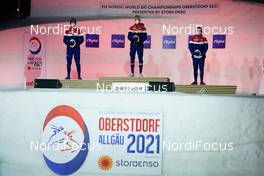 27.02.2021, Oberstdorf, Germany (GER): Erik Valnes (NOR), Johannes Hoesflot Klaebo (NOR), Haavard Solaas Taugboel (NOR), (l-r)  - FIS nordic world ski championships cross-country, medals, Oberstdorf (GER). www.nordicfocus.com. © Thibaut/NordicFocus. Every downloaded picture is fee-liable.