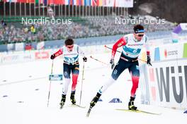 27.02.2021, Oberstdorf, Germany (GER): Johannes Hoesflot Klaebo (NOR), Emil Iversen (NOR), (l-r)  - FIS nordic world ski championships cross-country, skiathlon men, Oberstdorf (GER). www.nordicfocus.com. © Modica/NordicFocus. Every downloaded picture is fee-liable.