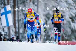 27.11.2021, Ruka, Finland (FIN): Jonas Baumann (SUI), Remi Lindholm (FIN), Jan Pechousek (CZE), (l-r)  - FIS world cup cross-country, 15km men, Ruka (FIN). www.nordicfocus.com. © Thibaut/NordicFocus. Every downloaded picture is fee-liable.