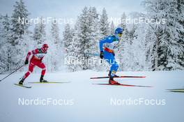 28.11.2021, Ruka, Finland (FIN): Andrey Larkov (RUS), Federico Pellegrino (ITA), (l-r)  - FIS world cup cross-country, pursuit men, Ruka (FIN). www.nordicfocus.com. © Modica/NordicFocus. Every downloaded picture is fee-liable.