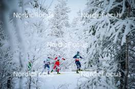28.11.2021, Ruka, Finland (FIN): Juuso Makela (FIN), Mateusz Haratyk (POL), Hunter Wonders (USA), (l-r)  - FIS world cup cross-country, pursuit men, Ruka (FIN). www.nordicfocus.com. © Modica/NordicFocus. Every downloaded picture is fee-liable.
