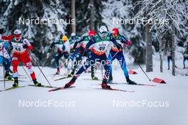 28.11.2021, Ruka, Finland (FIN): Dominik Bury (POL), David Norris (USA), (l-r)  - FIS world cup cross-country, pursuit men, Ruka (FIN). www.nordicfocus.com. © Modica/NordicFocus. Every downloaded picture is fee-liable.