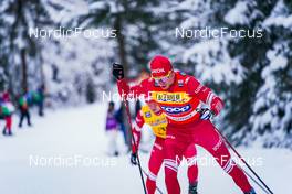 04.12.2021, Lillehammer, Norway (NOR): Denis Spitsov (RUS), Alexander Bolshunov (RUS), (l-r)  - FIS world cup cross-country, 15km men, Lillehammer (NOR). www.nordicfocus.com. © Thibaut/NordicFocus. Every downloaded picture is fee-liable.