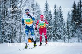 05.12.2021, Lillehammer, Norway (NOR): Iivo Niskanen (FIN), Alexander Bolshunov (RUS), (l-r)  - FIS world cup cross-country, 4x7.5km men, Lillehammer (NOR). www.nordicfocus.com. © Modica/NordicFocus. Every downloaded picture is fee-liable.