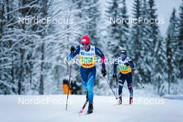 05.12.2021, Lillehammer, Norway (NOR): Jonas Baumann (SUI), David Norris (USA), (l-r)  - FIS world cup cross-country, 4x7.5km men, Lillehammer (NOR). www.nordicfocus.com. © Modica/NordicFocus. Every downloaded picture is fee-liable.