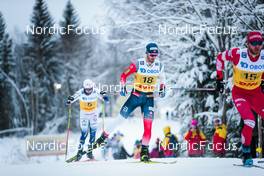 05.12.2021, Lillehammer, Norway (NOR): Leo Johansson (SWE), Hans Christer Holund (NOR), Artem Maltsev (RUS), (l-r)  - FIS world cup cross-country, 4x7.5km men, Lillehammer (NOR). www.nordicfocus.com. © Modica/NordicFocus. Every downloaded picture is fee-liable.