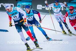 11.12.2021, Davos, Switzerland (SUI): Even Northug (NOR), Roman Schaad (SUI), (l-r)  - FIS world cup cross-country, individual sprint, Davos (SUI). www.nordicfocus.com. © Modica/NordicFocus. Every downloaded picture is fee-liable.