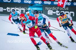 11.12.2021, Davos, Switzerland (SUI): Sergey Ustiugov (RUS), Erik Valnes (NOR), (l-r)  - FIS world cup cross-country, individual sprint, Davos (SUI). www.nordicfocus.com. © Modica/NordicFocus. Every downloaded picture is fee-liable.