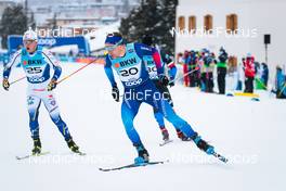 11.12.2021, Davos, Switzerland (SUI): Gustaf Berglund (SWE), Erwan Kaeser (SUI), (l-r)  - FIS world cup cross-country, individual sprint, Davos (SUI). www.nordicfocus.com. © Modica/NordicFocus. Every downloaded picture is fee-liable.