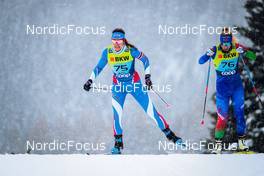 11.12.2021, Davos, Switzerland (SUI): Karen Chanloung (THA), Valeryia Davydzenka (BLR), (l-r)  - FIS world cup cross-country, individual sprint, Davos (SUI). www.nordicfocus.com. © Modica/NordicFocus. Every downloaded picture is fee-liable.