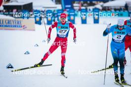 11.12.2021, Davos, Switzerland (SUI): Gleb Retivykh (RUS), Lucas Chanavat (FRA), (l-r)  - FIS world cup cross-country, individual sprint, Davos (SUI). www.nordicfocus.com. © Modica/NordicFocus. Every downloaded picture is fee-liable.